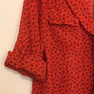 Sheer orange blouse with fun pattern!